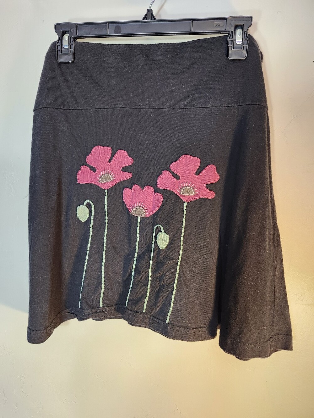 Synergy Organic Clothing Black A-Line Skirt with Pink Floral Embroidery